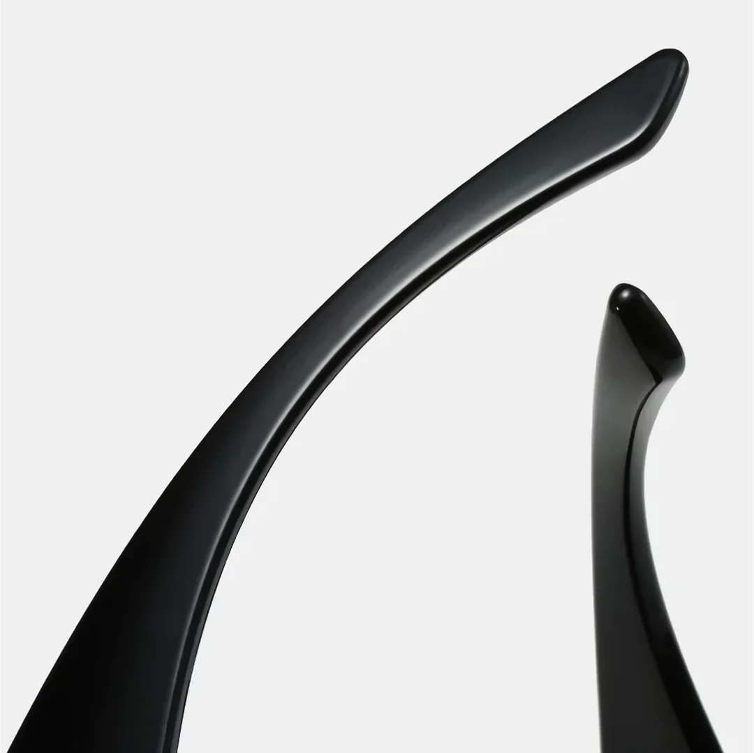 Oversized square sunglasses with black lenses and a durable plastic frame, offering UV400 protection and adaptive photochromic technology.