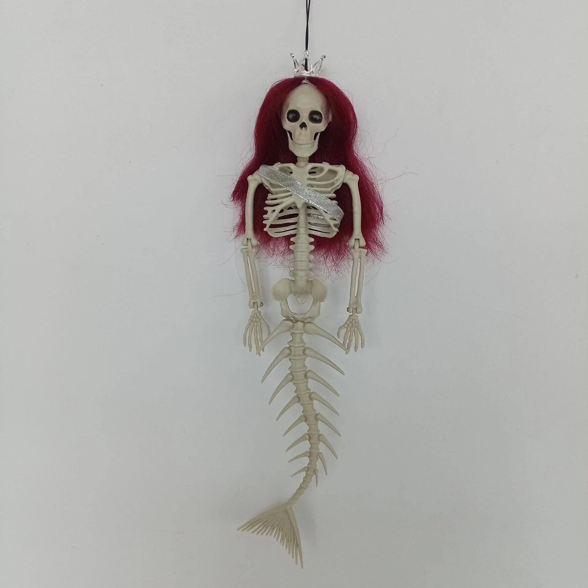 Mermaid bone pendant decoration in brown, dark purple, burgundy, and lake blue colours, ideal for Halloween outdoor courtyard displays