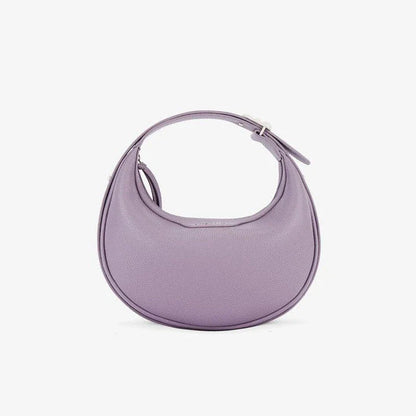 Stylish crescent-shaped leather crossbody bag with soft, supple texture for everyday elegance