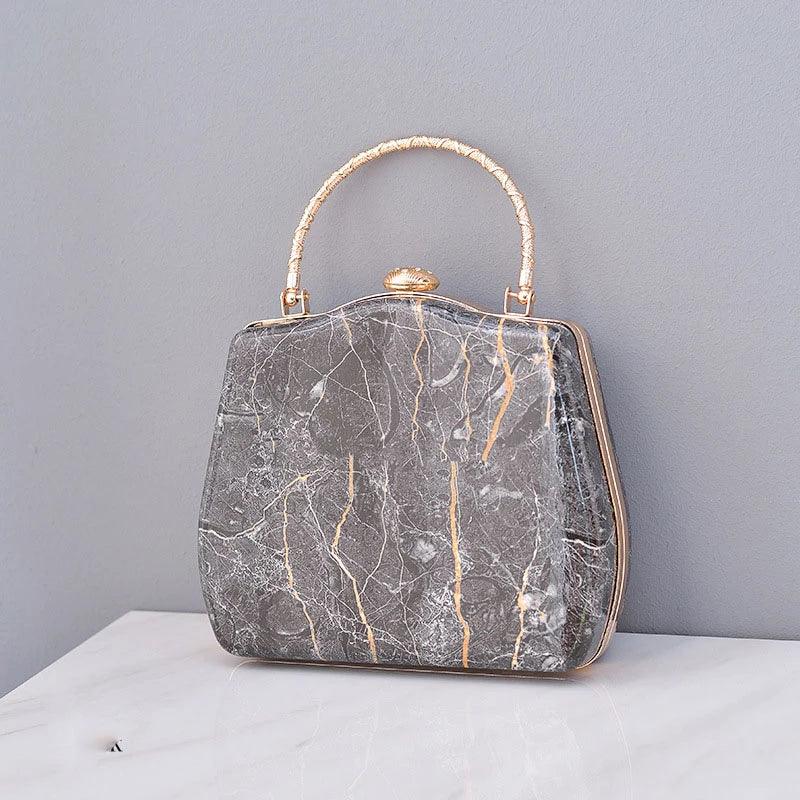 Premium marble-patterned crossbody bag for stylish ladies, featuring PU leather construction, roomy interior, and adjustable strap for hands-free carrying