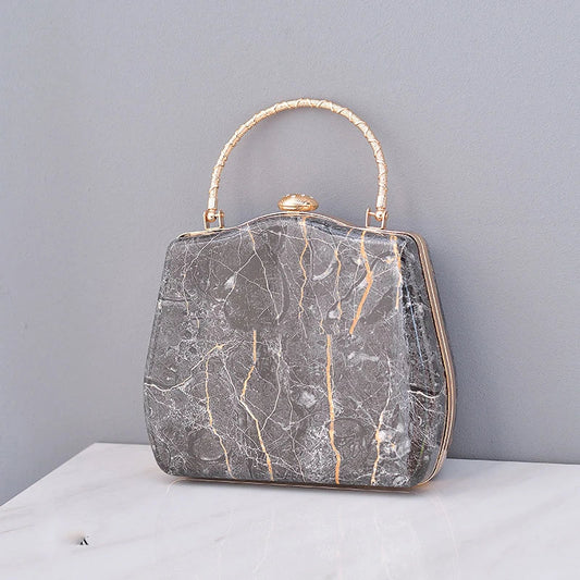 Premium marble-patterned crossbody bag for stylish ladies, featuring PU leather construction, roomy interior, and adjustable strap for hands-free carrying