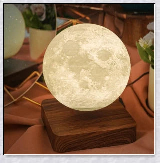 Lunamen Magnetic Levitating Moon Lamp with detailed lunar surface and floating above magnetic base