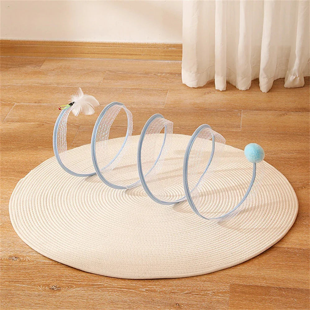 Folding cat play tunnel with various toys like balls, feathers, and mice attached to the sides