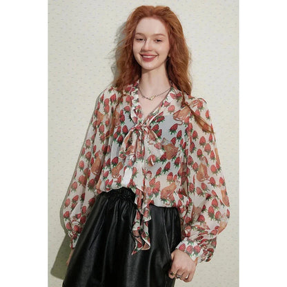 Stylish floral chiffon blouse with elegant lantern sleeves, vibrant patterns, and delicate bow collar
