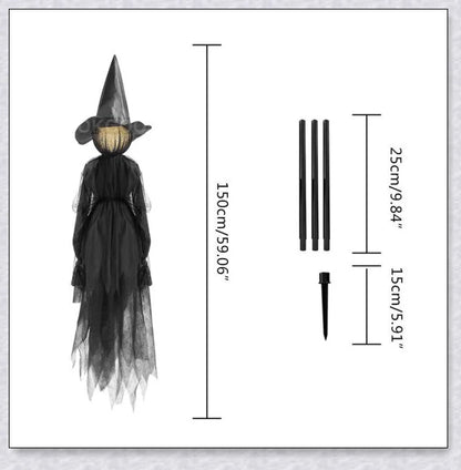Three tall, black-robed witch figures with faceless glowing heads, standing together and holding hands, creating a spooky outdoor Halloween display