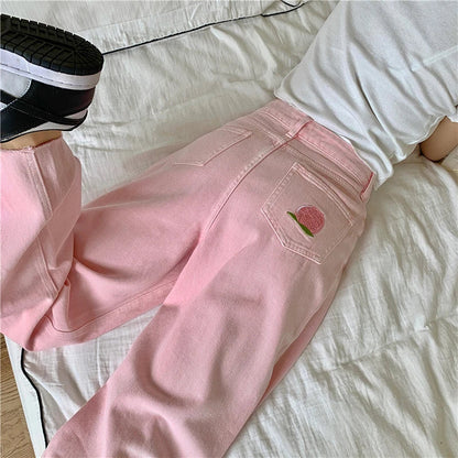 Premium cotton denim high-waist wide-leg trousers in a flattering, figure-hugging silhouette