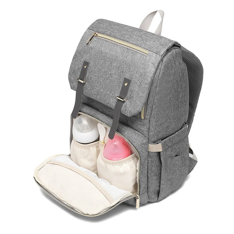 A stylish and practical mummy backpack with multiple pockets, perfect for organising and transporting all your parenting essentials.