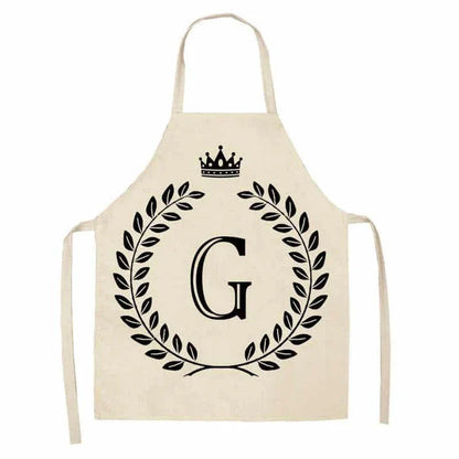 A high-quality kitchen apron featuring a charming crown and letter print design in a premium cotton and linen blend fabric.
