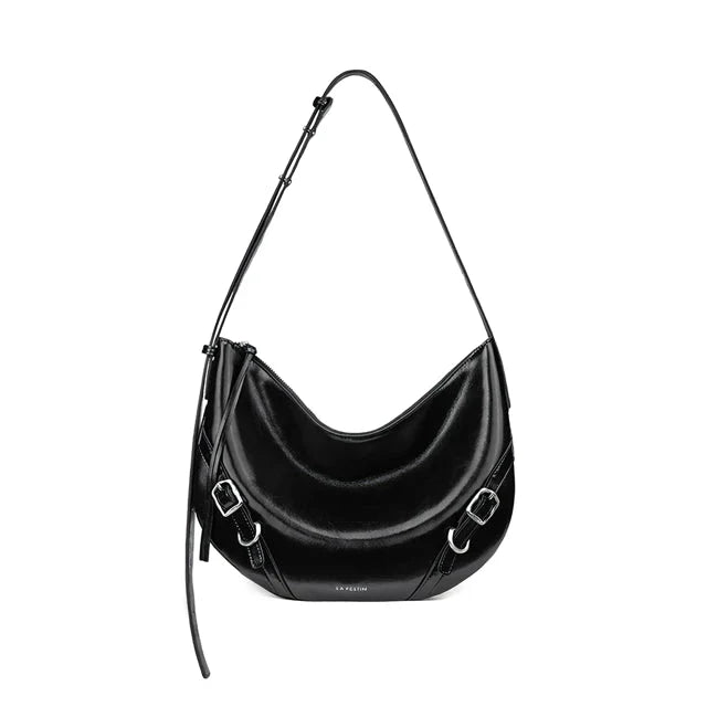 Elegant and versatile shoulder and crossbody bag in black, featuring a chic design, spacious compartments, and premium leather construction.