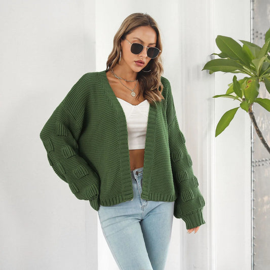 Elegant puff sleeve cardigan sweater in army green and wheat yellow colours, featuring a chunky knit design for cosy winter wear