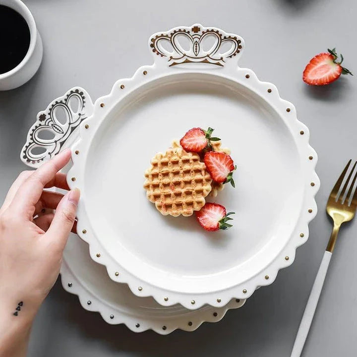 Elegant diamond ring-inspired porcelain dinnerware set with plate, bowl, and cup in a minimalist white colour