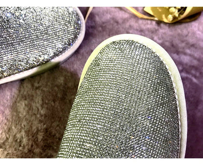 Premium rhinestone-embellished ankle boots for women, featuring a shimmering upper and durable rubber sole for winter wear