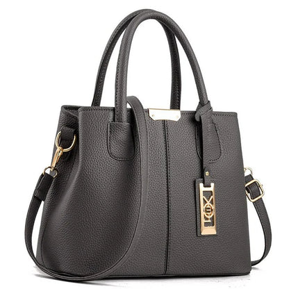A stylish one-shoulder tote bag in various colours, made of premium polyester with an adjustable strap and spacious interior for the modern professional woman.