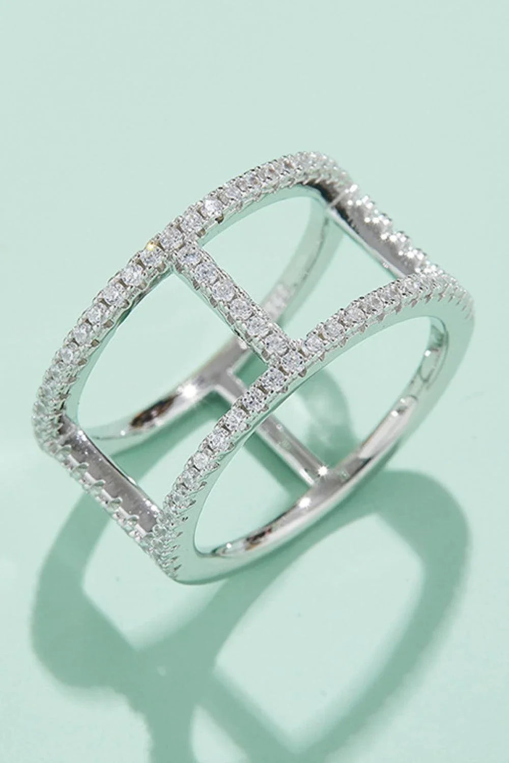 Elegant silver moissanite promise ring with minimalist design, showcasing premium materials and exceptional sparkle