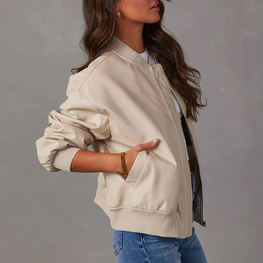 Stylish leather baseball jacket with Peter Pan collar, perfect for casual British streetwear