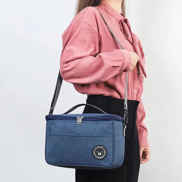 Premium thermal lunch bag in various colours, featuring insulation, waterproof design, and adjustable shoulder strap for busy UK professionals