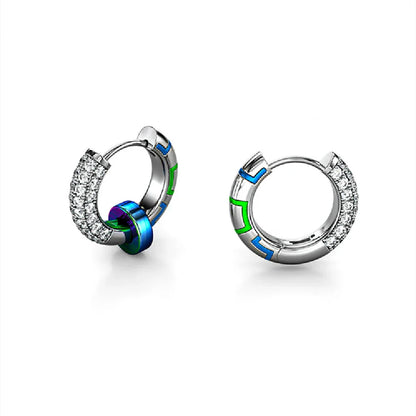 Sterling silver earrings with luminous accents, providing a soft, gentle glow for a touch of elegant sophistication.