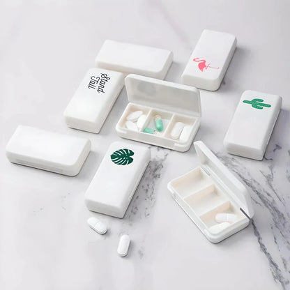 Compact and stylish 3-compartment pill organiser for travelling, made from durable, eco-friendly plastic