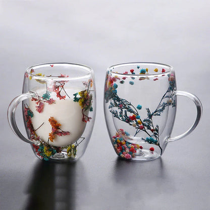 Elegant double-walled glass tea mug with captivating floral display, perfect for hot and cold beverages