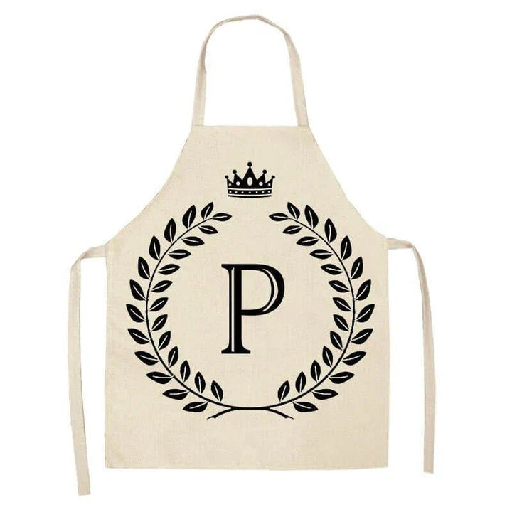 A high-quality kitchen apron featuring a charming crown and letter print design in a premium cotton and linen blend fabric.