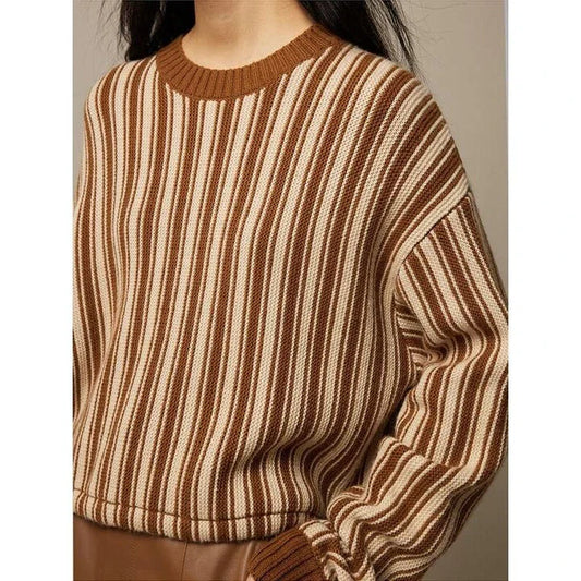 A chic striped wool-blend jumper in black, featuring an elegant O-neck design and a relaxed, flattering fit