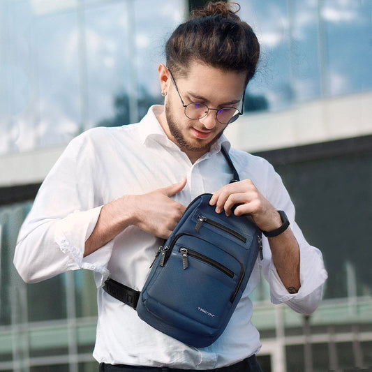 Premium waterproof men's chest bag in dark blue colour, featuring a sleek and sophisticated design with a spacious main compartment and secure zipper closure.
