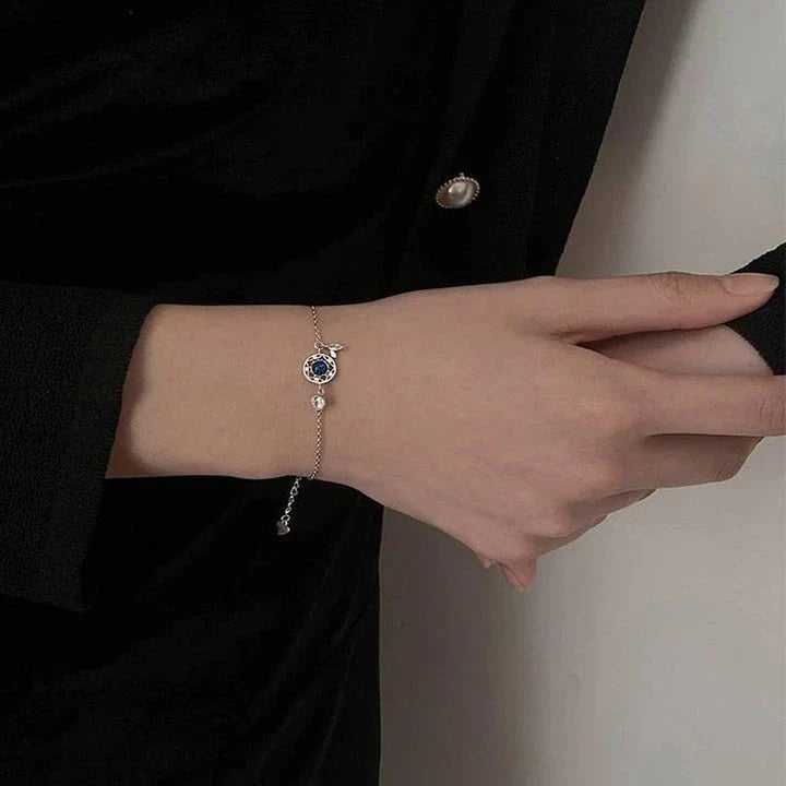 Enchanting sterling silver bracelet with genuine moonstone and celestial motifs