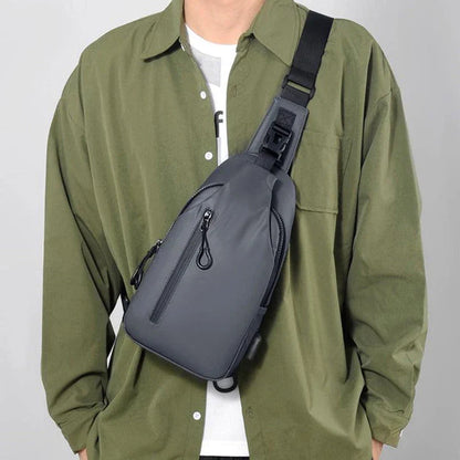 Versatile blue sling crossbody backpack for men with adjustable strap and spacious interior