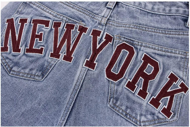 Premium high-waisted straight-leg jeans in light blue denim, a classic British style