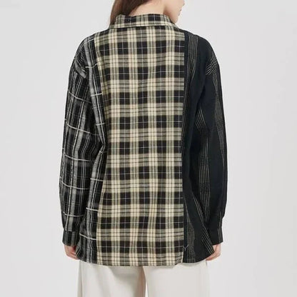 A stylish plaid shirt with a unique patchwork design, made from a comfortable cotton-blend fabric.