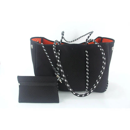 A neoprene beach bag in a stylish design, perfect for British summer adventures at the coast