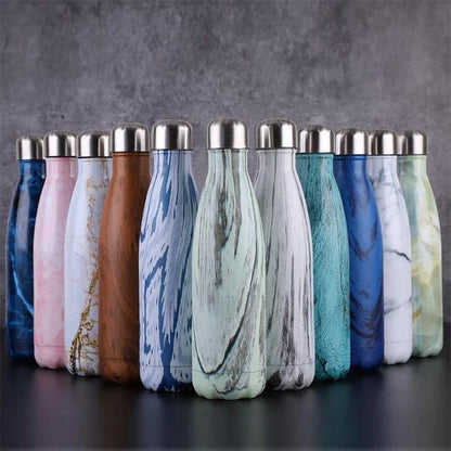 Premium stainless steel water bottle with double-walled vacuum insulation, available in pink colour and 500ml capacity