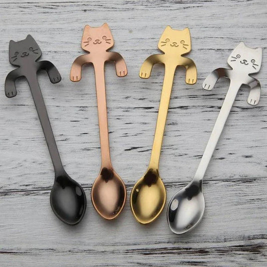 A silver cat-shaped stainless steel coffee spoon with a polished finish