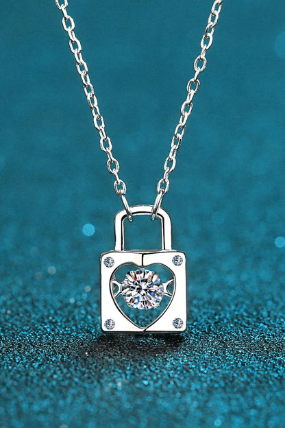 Elegant sterling silver moissanite lock pendant necklace with a minimalist, modern design
