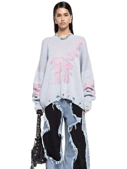 A stylish ripped long sleeve top in a variety of versatile colours, including grey, green, and black.