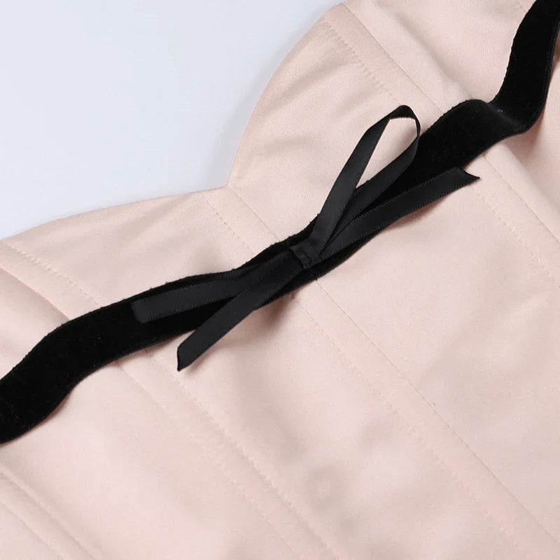 Stylish bow-accented waist back fashion in pink, made with premium polyester for a comfortable and flattering fit.