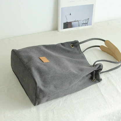 Premium canvas lattice shoulder bag in various colours, featuring a spacious design with secure zipper closure and adjustable strap for comfortable everyday carry