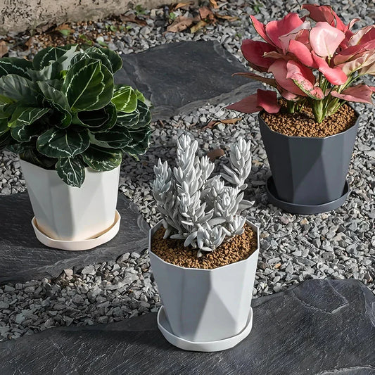 Nordic-style resin flower pot in grey, featuring a minimalist design and suitable for indoor use in UK homes and offices