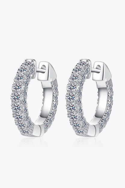 Elegant 925 sterling silver moissanite huggie earrings with a minimalist design and polished finish