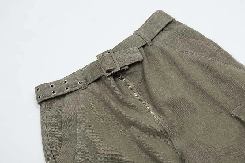 Premium purple streetwear cargo jeans with multiple pockets, wide-leg silhouette, and zippered placket for adjustable fit