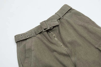 Premium purple streetwear cargo jeans with multiple pockets, wide-leg silhouette, and zippered placket for adjustable fit