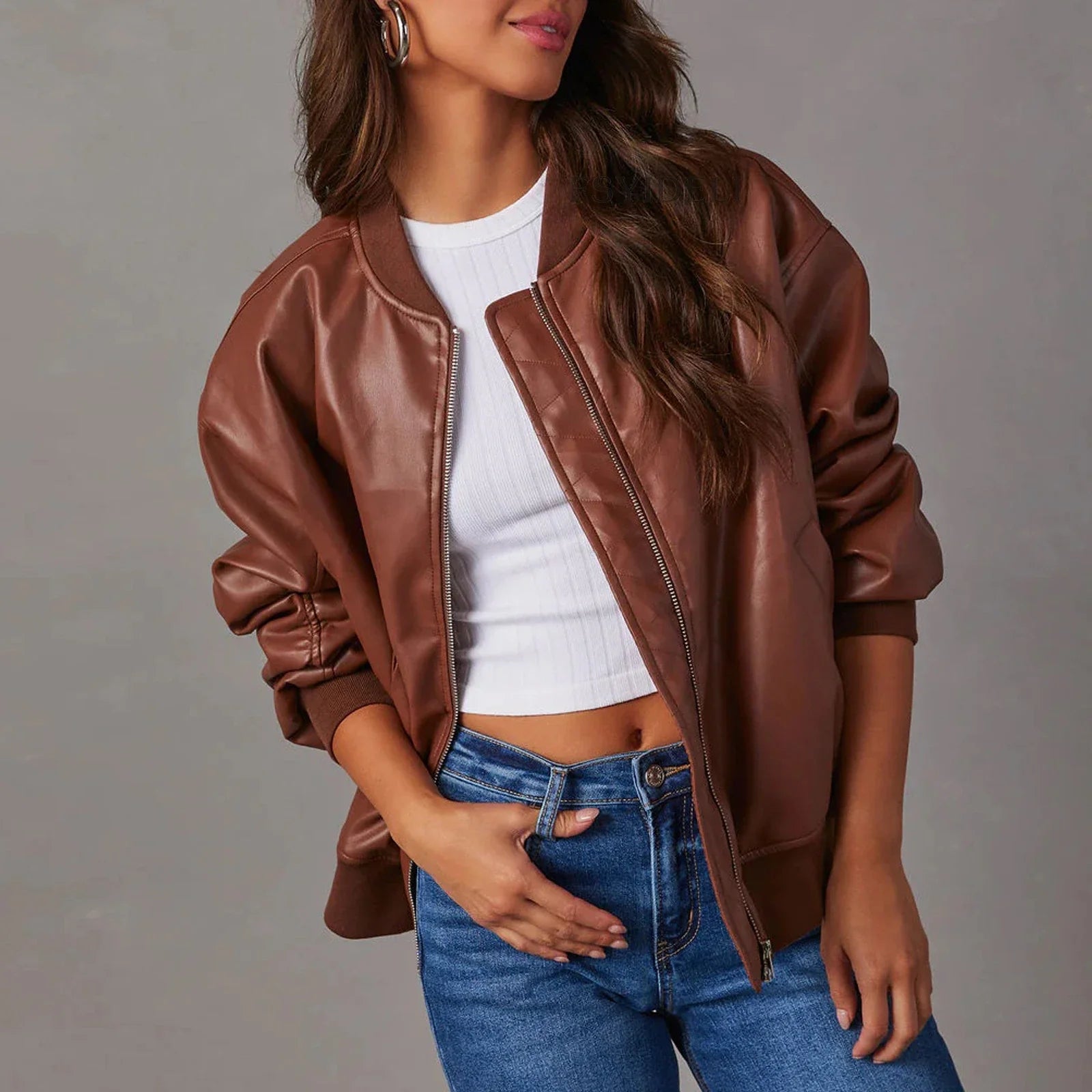 Stylish leather baseball jacket with Peter Pan collar, perfect for casual British streetwear
