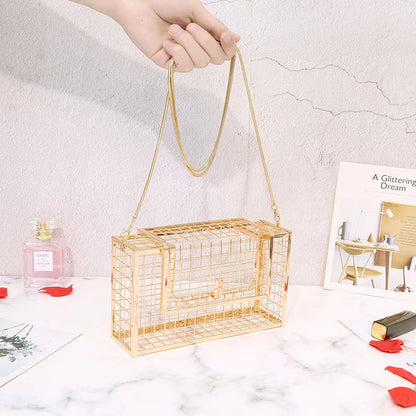 A sophisticated British-designed metal mesh clutch bag with a chain strap, available in various colours and chain styles