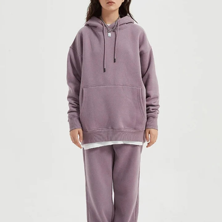 Cosy fleece hoodie and jogger set in light pink, grey, and navy blue colours for ultimate comfort and style
