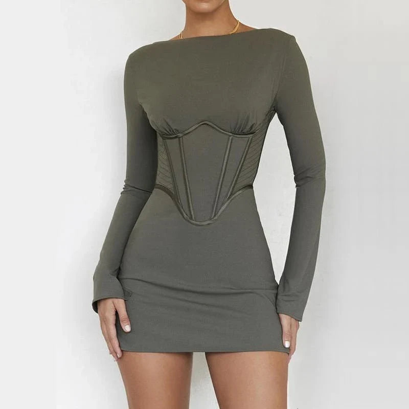 Elegant backless mini dress with full sleeves, made from a premium cotton-polyester blend for comfort and durability.