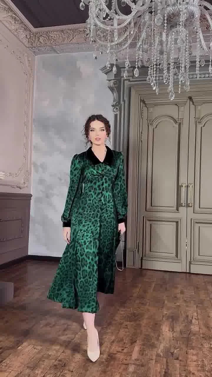 A stylish leopard print dress with a waist-trimming design, perfect for adding a touch of feline fierceness to your wardrobe.