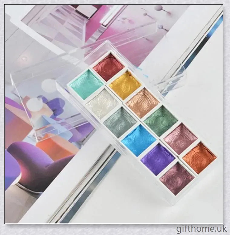 A set of vibrant watercolour paints with a glittering, iridescent effect, including brushes, a palette, and paper for a complete painting experience.