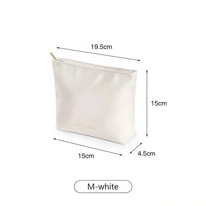 A versatile PU leather organiser bag in white and brown colours, designed to keep your daily essentials organised and your travels stylish.