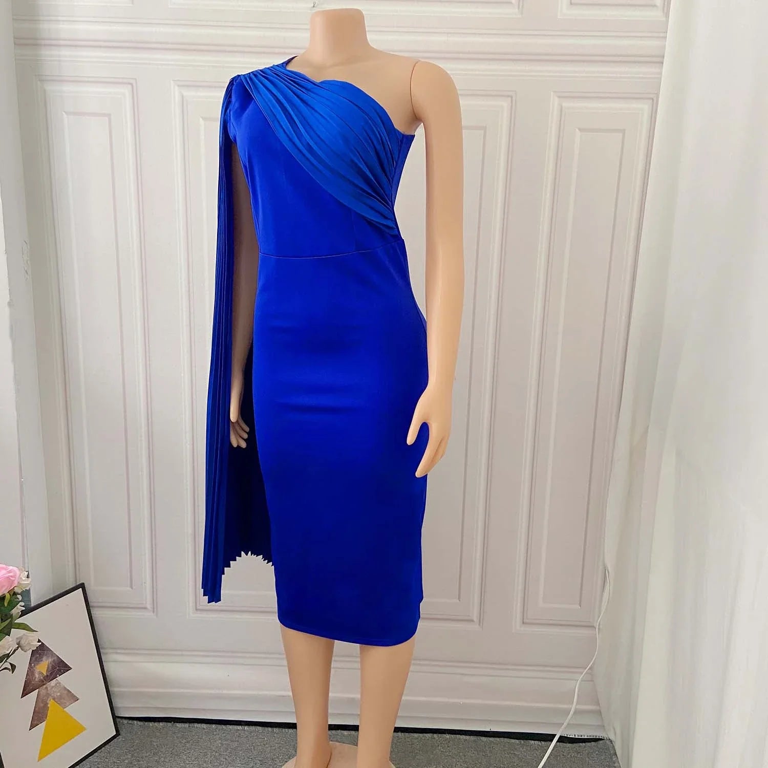 Sophisticated one-shoulder plus size evening dress with an alluring asymmetric neckline and figure-flattering silhouette