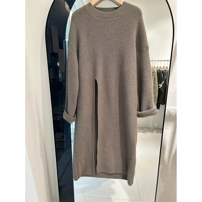 Relaxed mid-length jumper dress in a variety of colours, featuring an A-line silhouette and premium knit fabric for a comfortable, flattering fit.